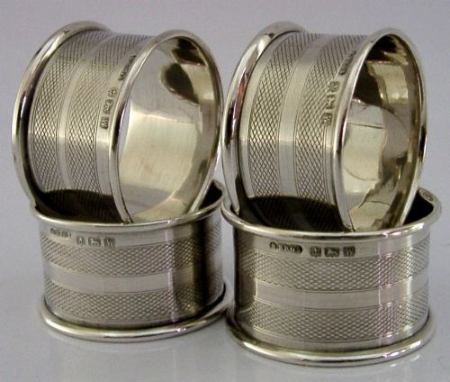 FOUR ENGLISH SOLID STERLING SILVER ENGINE TURNED NAPKIN RINGS 1921 ART DECO - ADDITIONAL PHOTO 1