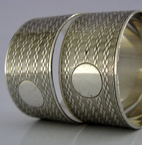 TWO ENGLISH CHESTER SOLID STERLING SILVER ENGINE TURNED NAPKIN RINGS 1929 50G - ADDITIONAL PHOTO 1