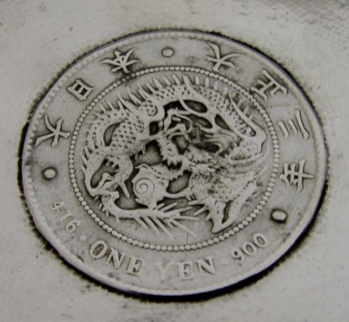 A square sterling silver coin dish featuring a central Japanese One Yen silver coin, hand-hammered interior border, and bamboo-style rim. View III