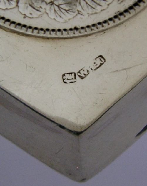 A square sterling silver coin dish featuring a central Japanese One Yen silver coin, hand-hammered interior border, and bamboo-style rim. View VI