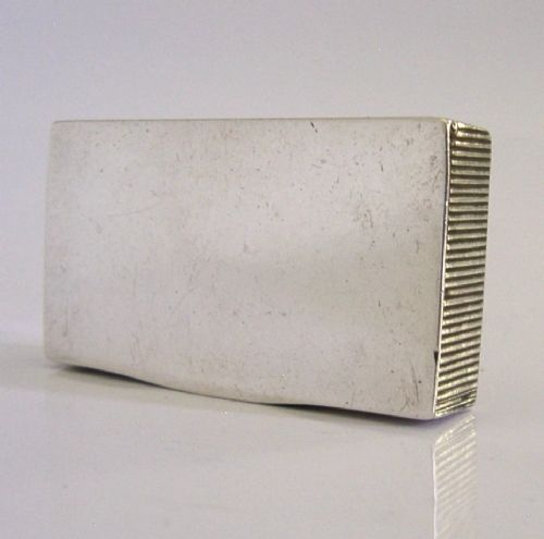 A Victorian sterling silver combination vesta case and go-to-bed taper holder with its hinged lid open. View VI