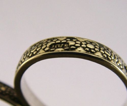 A pair of 19th-century Dutch solid silver needlework scissors featuring engraved oval finger loops and steel blades. View VIII