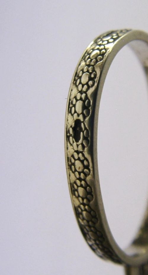 A pair of 19th-century Dutch solid silver needlework scissors featuring engraved oval finger loops and steel blades. View IX