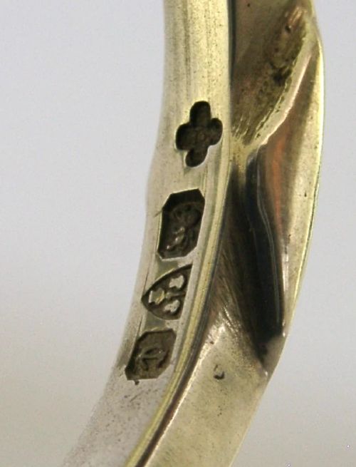 A pair of sterling silver horseshoe-shaped napkin rings presented inside a silk-lined leatherette presentation box. View VI
