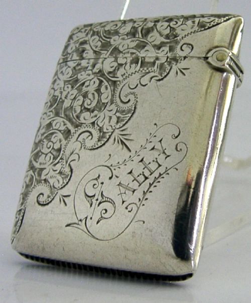 An engraved sterling silver Victorian vesta case featuring elaborate scrollwork detailing and the engraved name Sarah. View IV