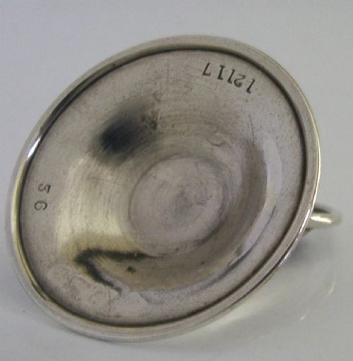 An Art Nouveau sterling silver menu holder featuring a relief face of a maiden with flowing hair set on a domed circular base with British hallmarks. View IV