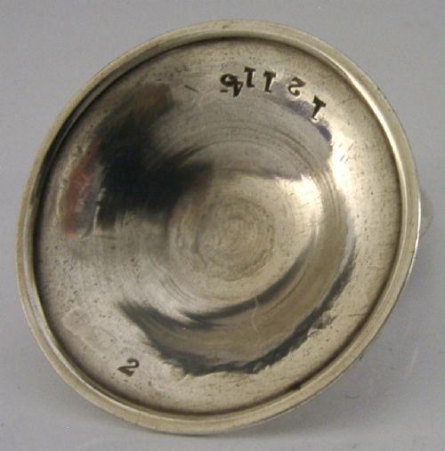 An Art Nouveau sterling silver menu holder featuring a relief profile of a maiden with flowing hair framed by a circular wire loop. View IV