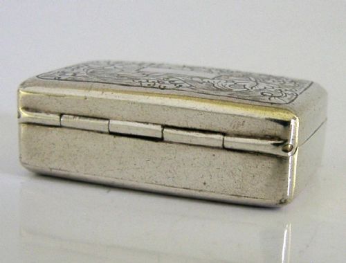 An open nineteenth-century rectangular Chinese export silver vinaigrette box showing a gilded interior with an intricately pierced floral grille. View X