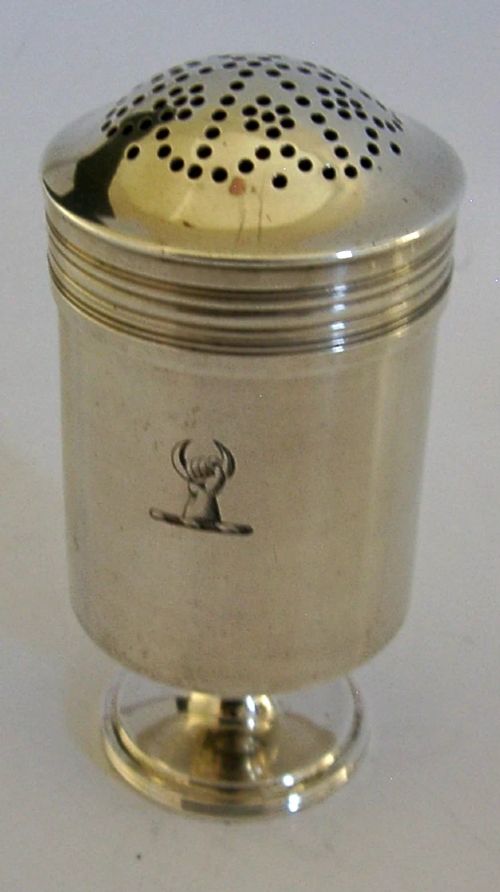 A Georgian sterling silver cylindrical caster top showing a hand-pierced dome with a gilded interior. View VI
