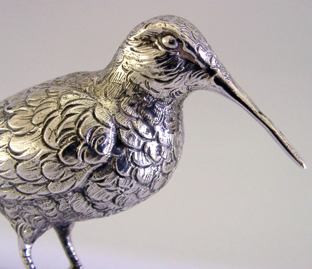 An 830 silver figurine of a woodcock featuring detailed feather chasing and a long slender beak. View II