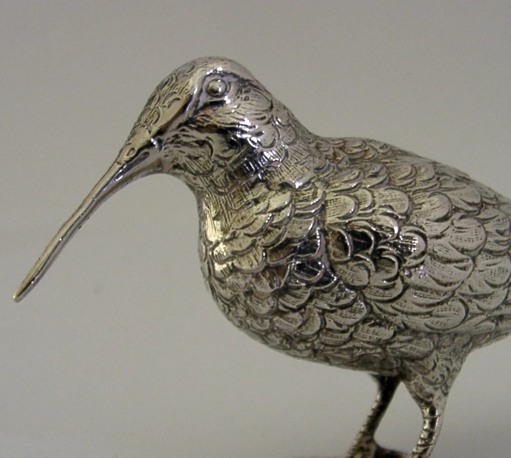An 830 silver figurine of a woodcock featuring detailed feather chasing and a long slender beak. View III
