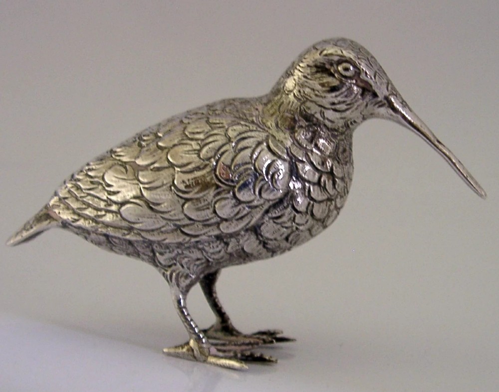 An 830 silver figurine of a woodcock featuring detailed feather chasing and a long slender beak. View IV