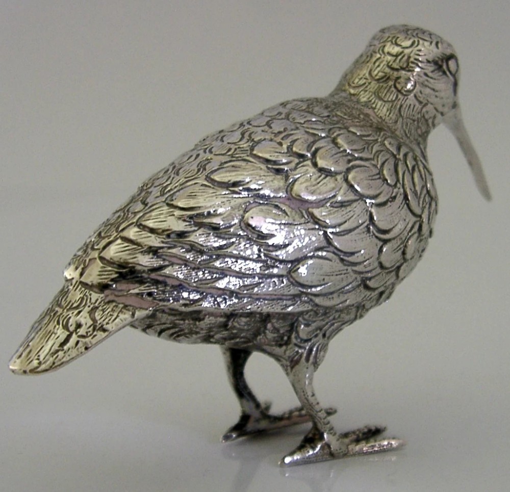 An 830 silver figurine of a woodcock featuring detailed feather chasing and a long slender beak. View VI