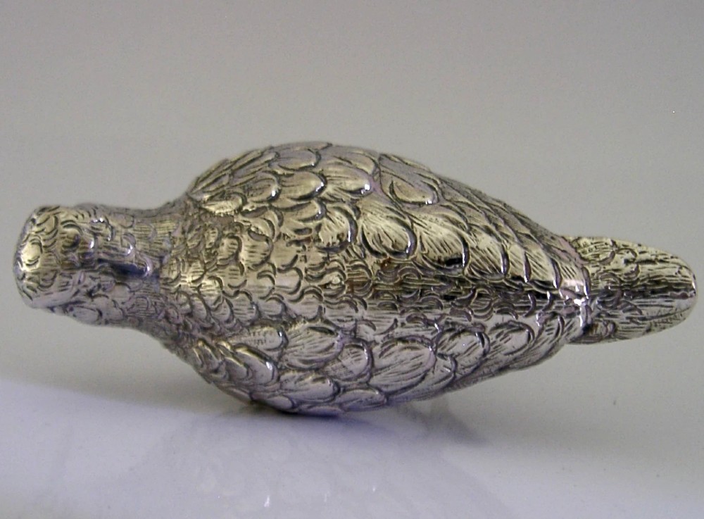 An 830 silver figurine of a woodcock featuring detailed feather chasing and a long slender beak. View VIII