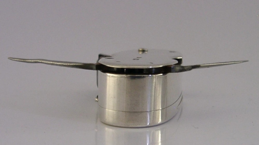 A Victorian sterling silver cigar cutter multi-tool with hallmarked silver casing and open fold-out steel implement. View VI