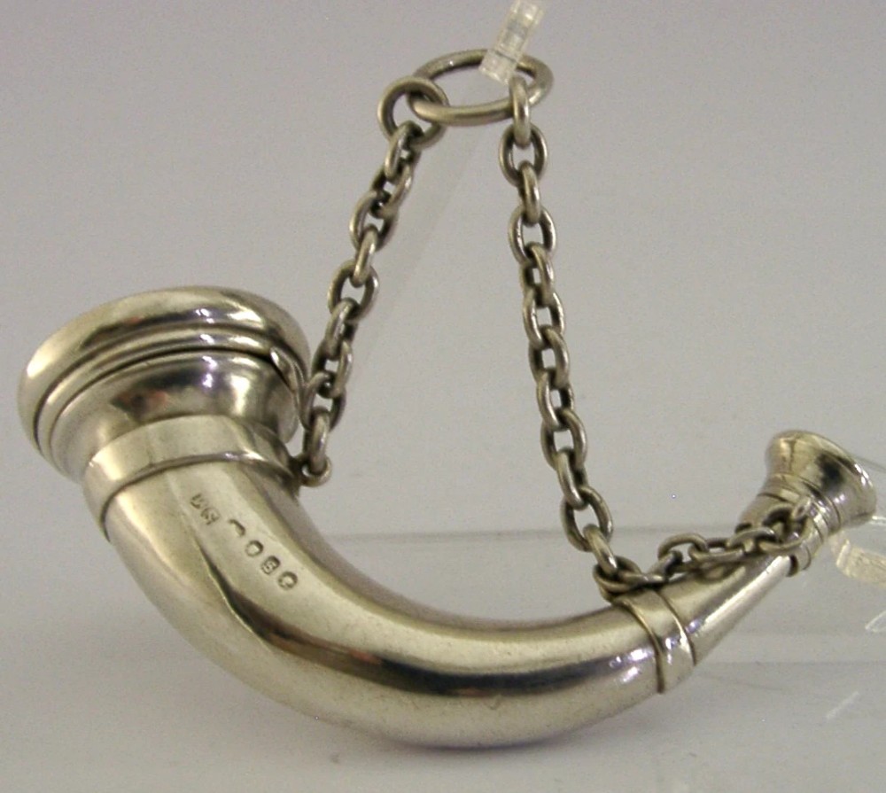 Victorian sterling silver vinaigrette shaped as a curved hunting horn with attached suspension chain. View VII