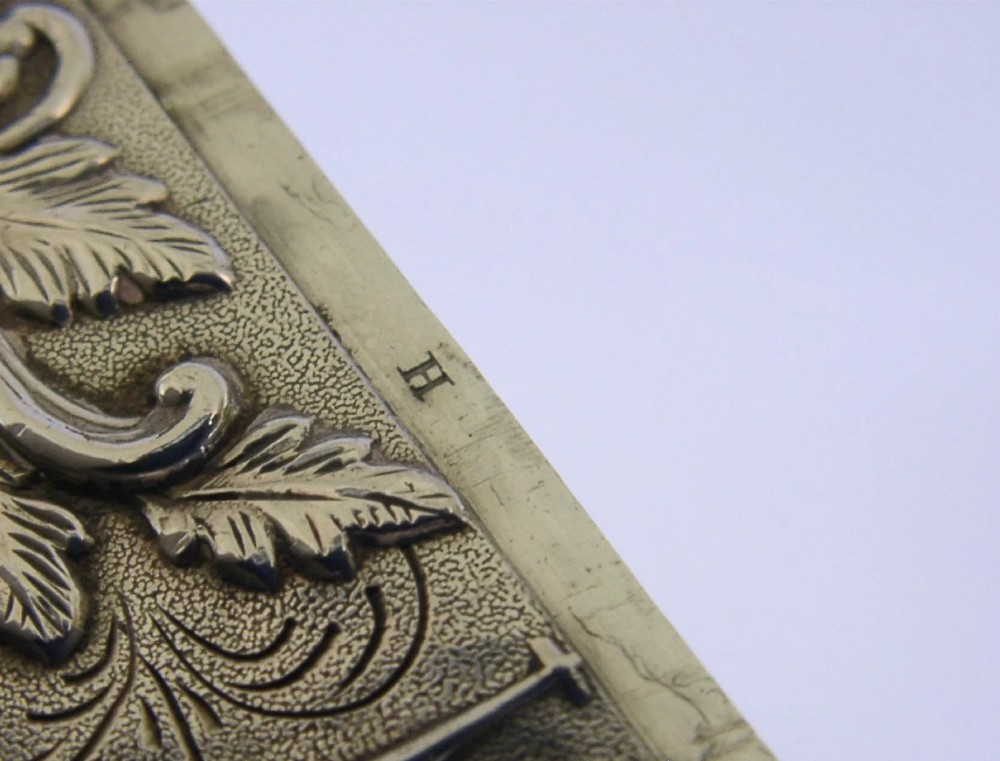 A mid-19th-century sterling silver card case featuring an embossed architectural depiction of Trinity Church surrounded by foliate scrollwork. View XII