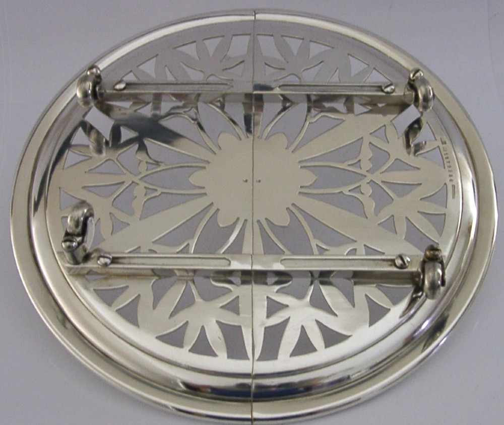 A circular French Art Deco silver plated extending dish stand featuring pierced botanical foliage motifs. View II