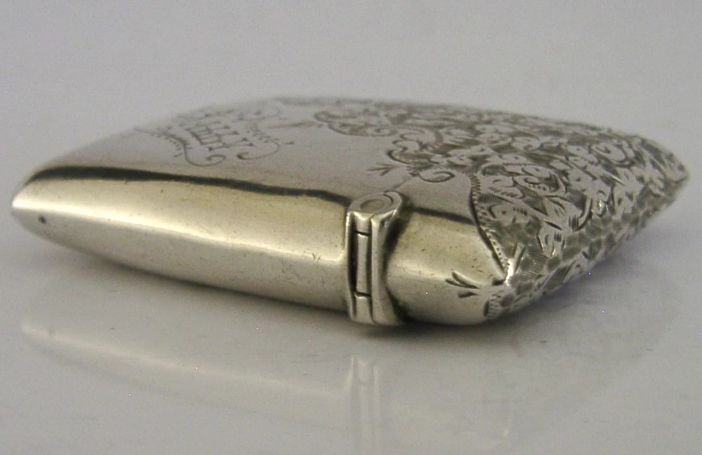An engraved sterling silver Victorian vesta case featuring elaborate scrollwork detailing and the engraved name Sarah. View VIII