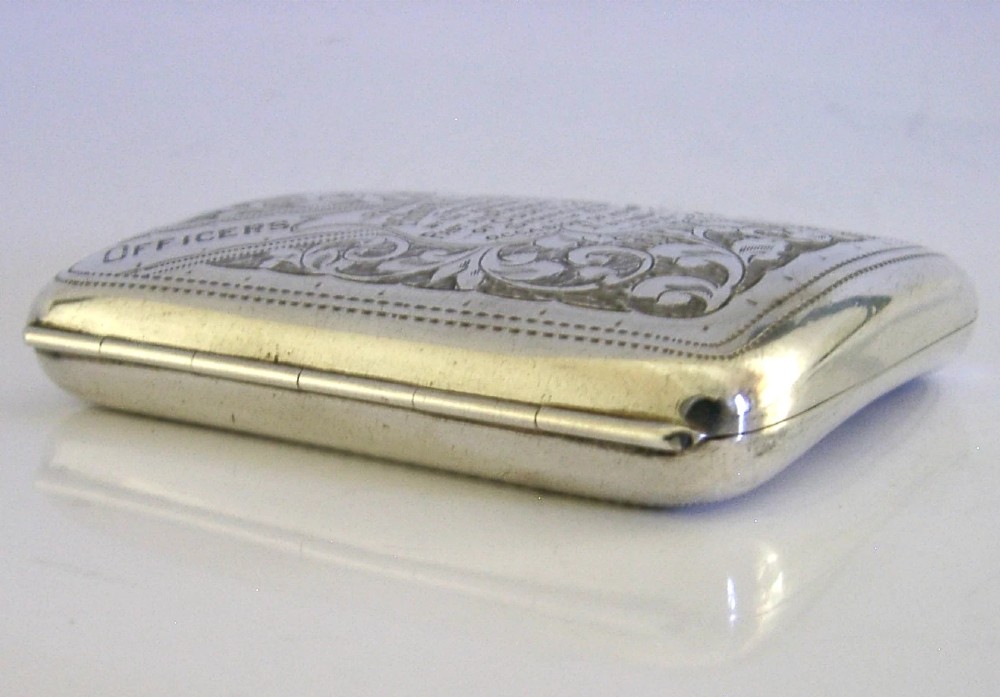 An engraved Edwardian sterling silver cigarette case featuring floral foliage and presentation text for the Independent Order of Oddfellows dated November 1910. View VII