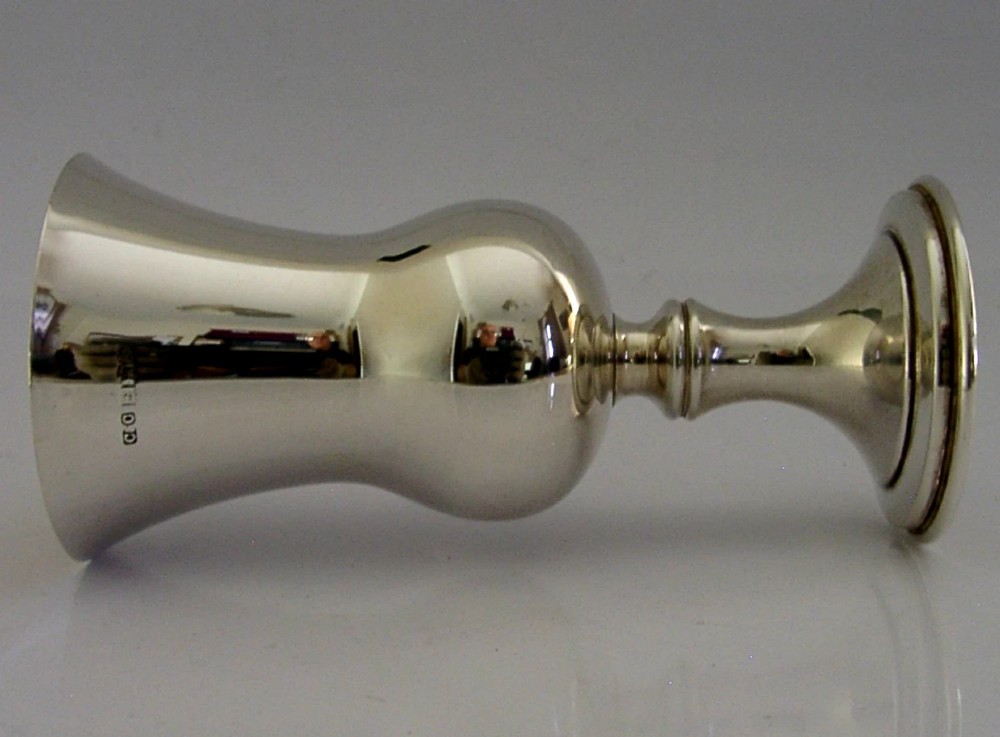 A sterling silver wine goblet featuring a bulbous bowl with a flared rim, a gilt interior, a short turned stem, and a stepped circular foot. View IV