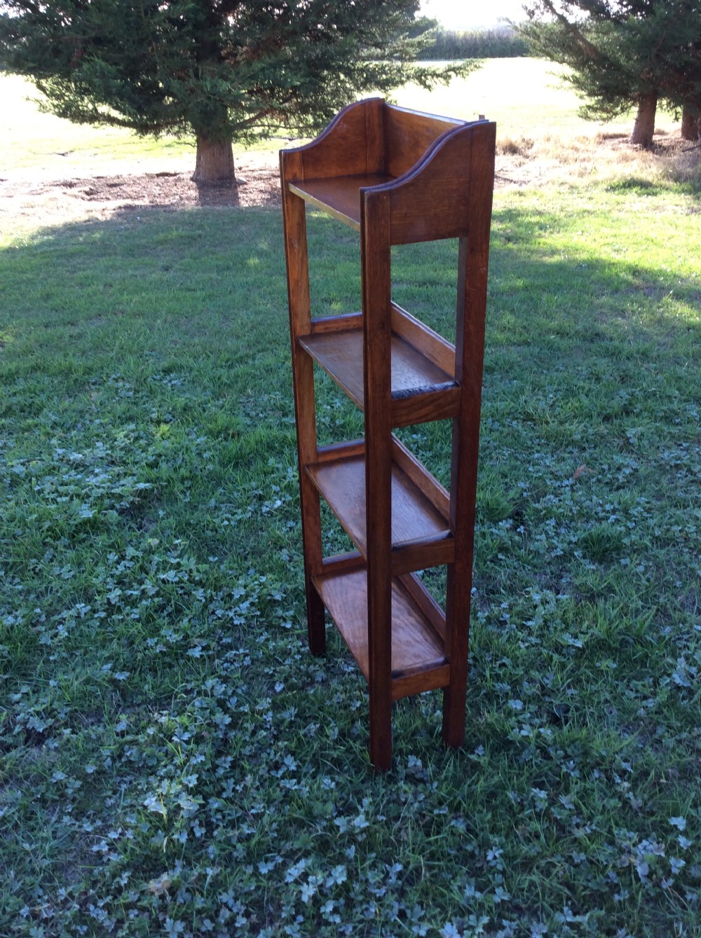 Oak open bookcase complete with set of Charles Dickens novels View IV