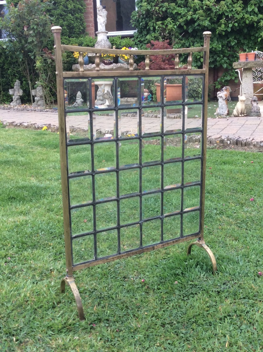 Victorian brass fire screen with leaded bevelled glass