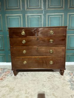 19TH CENTURY MAHOGANY CHEST OF TWO SHORT OVER THREE LONG GRADUATED DRAWERS RESTING ON TURNED LEGS