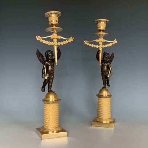 pair of french empire gilt bronze cherub candlesticks - CATEGORY: ANTIQUE LIGHTING - DATED 19TH CENTURY