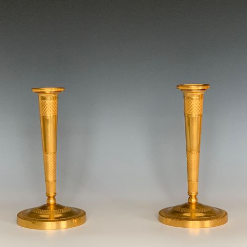 a pair of french empire ormolu bronze candlesticks - CATEGORY: ANTIQUE LIGHTING - DATED 19TH CENTURY
