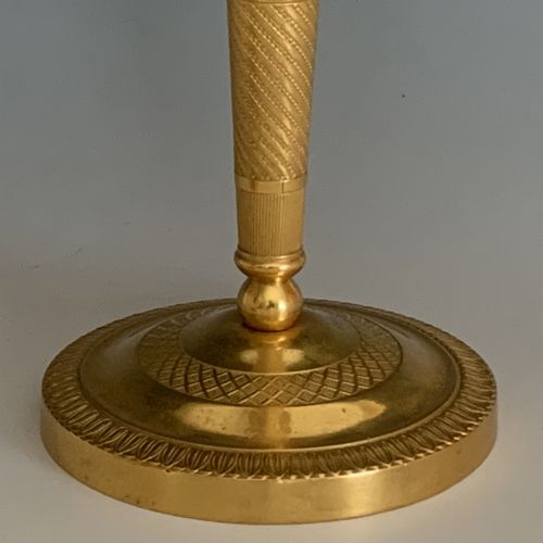 A PAIR OF FRENCH EMPIRE ORMOLU BRONZE CANDLESTICKS - ADDITIONAL PHOTO 1