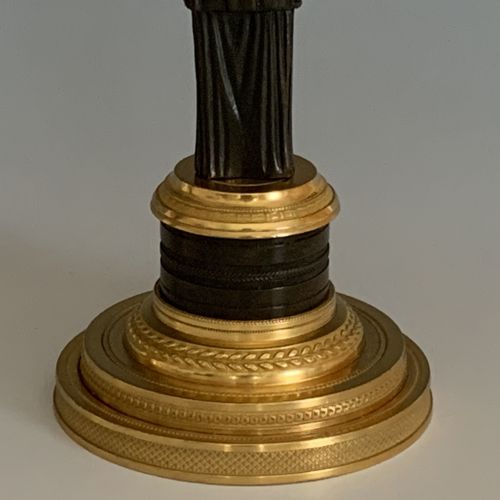 A PAIR OF FRENCH EMPIRE GILT PATINATED BRONZE CANDLESTICKS - ADDITIONAL PHOTO 1
