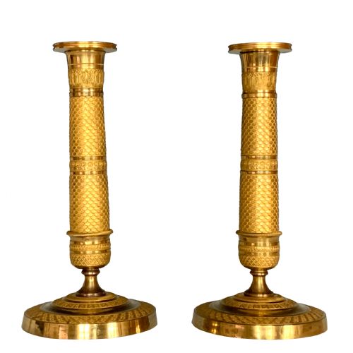 A PAIR OF FRENCH EMPIRE GILT BRONZE CANDLESTICKS - ADDITIONAL PHOTO 1