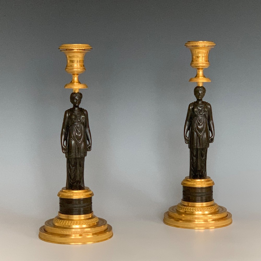 A Pair of French Empire Gilt & Patinated Bronze Candlesticks