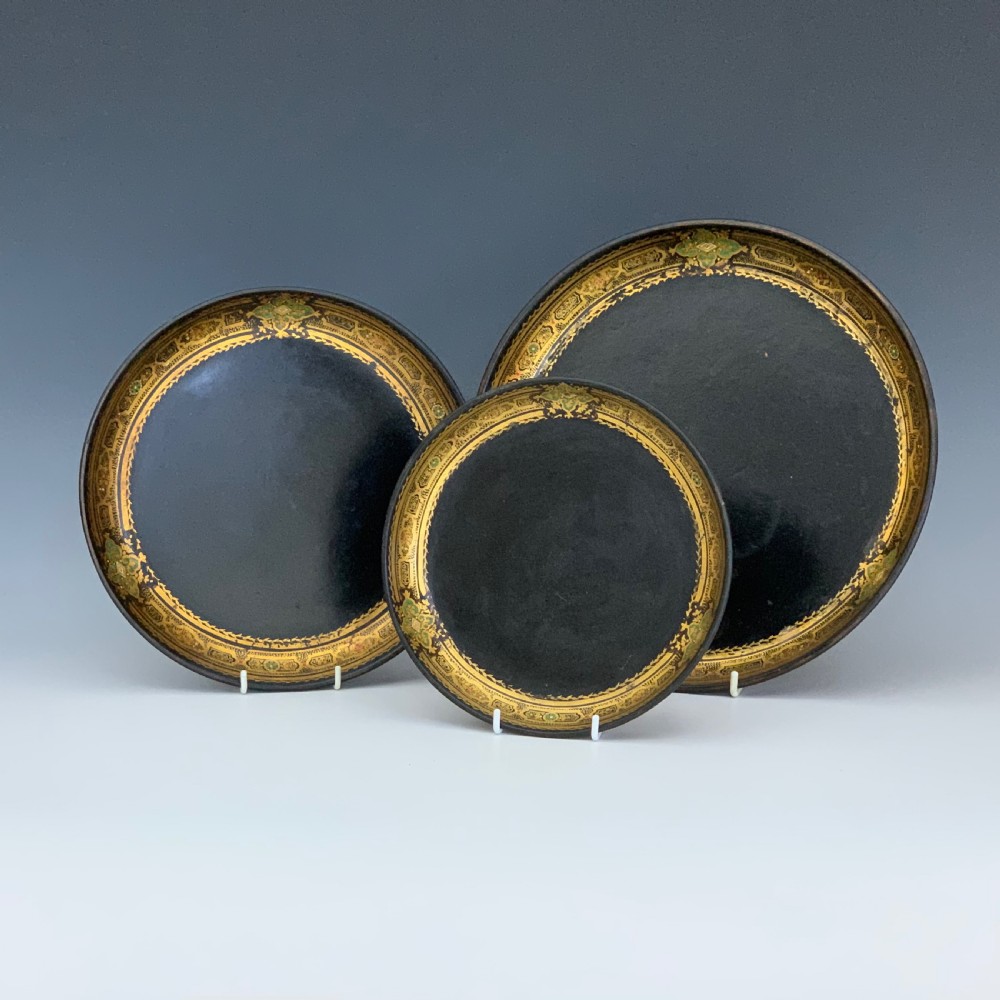 A set of Three Graduated Victorian Papier Mache Trays