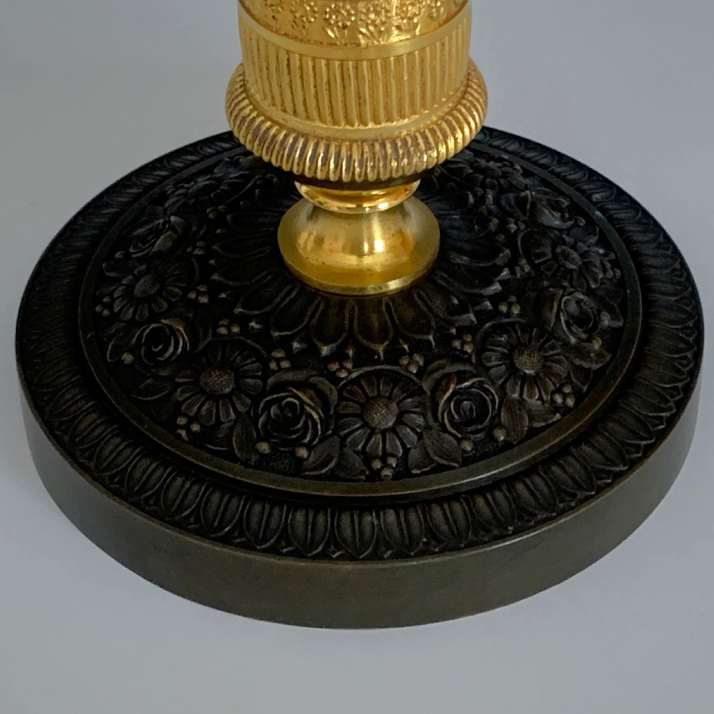 A Pair of French Empire Ormolu & Bronze Candlesticks View III
