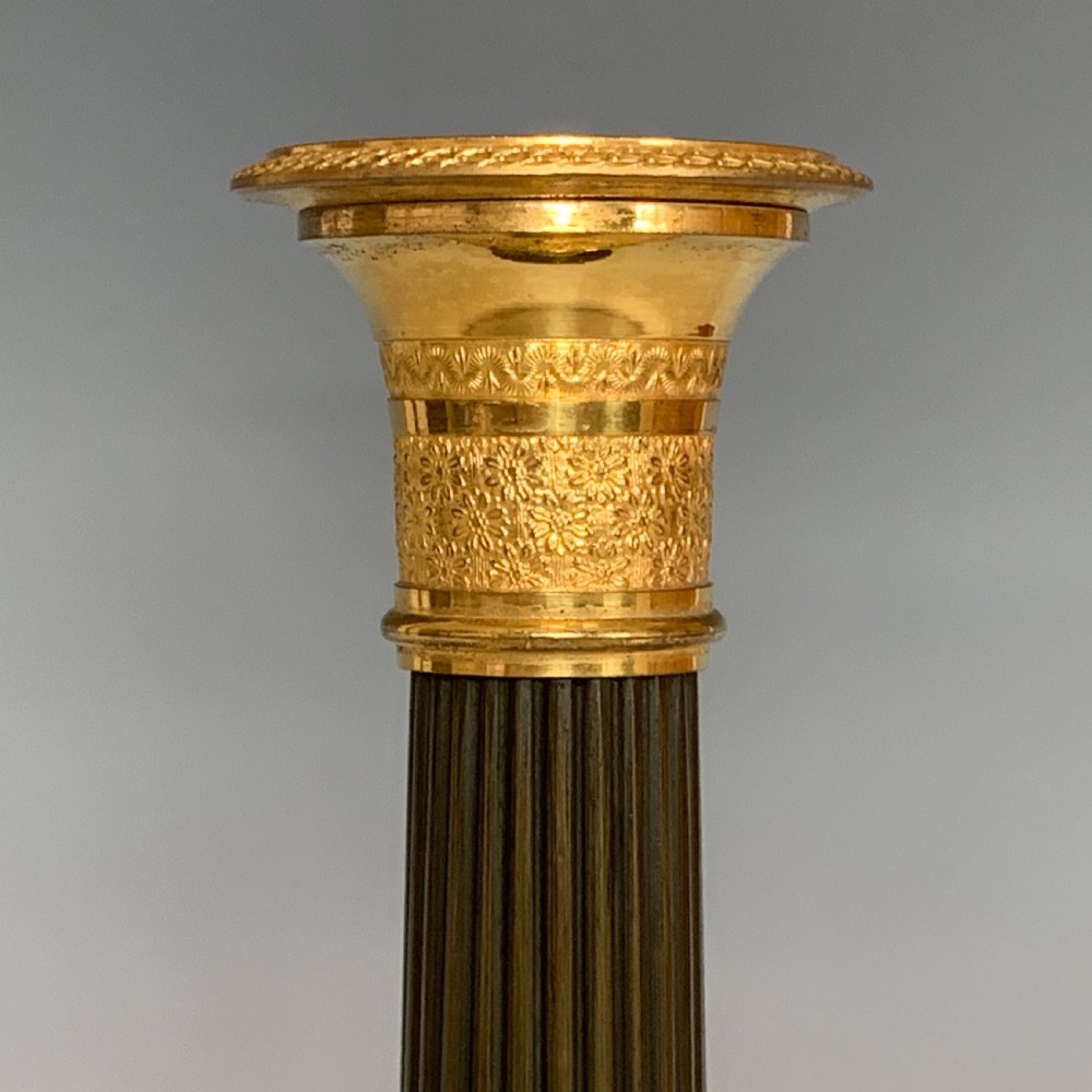 A Pair of French Empire Ormolu & Bronze Candlesticks View IV