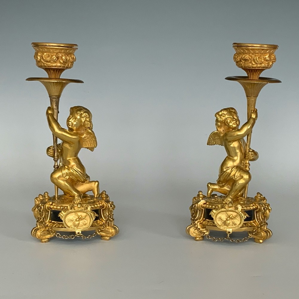 A Pair of Antique Victorian Ormolu Cherub Candlesticks View III