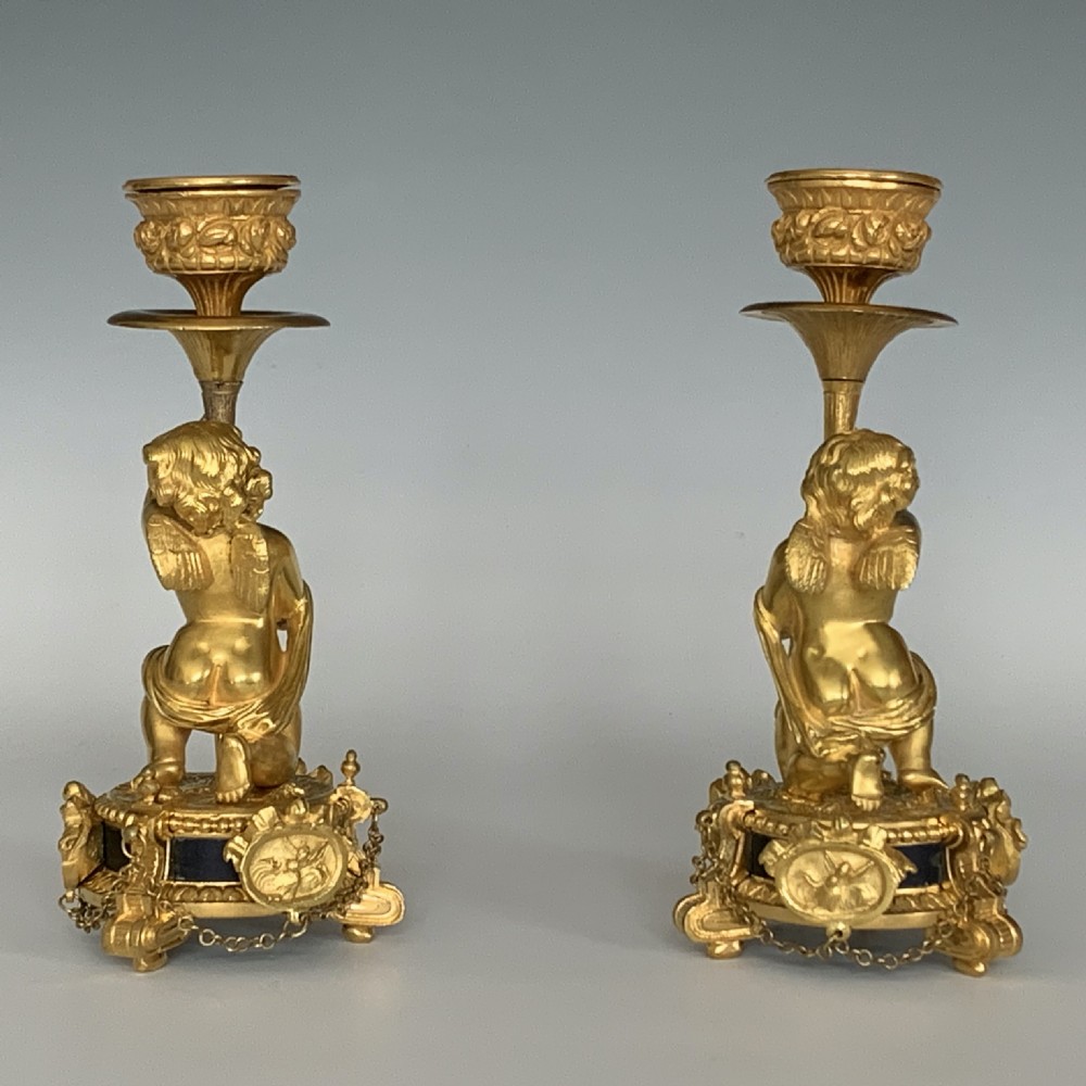 A Pair of Antique Victorian Ormolu Cherub Candlesticks View IV