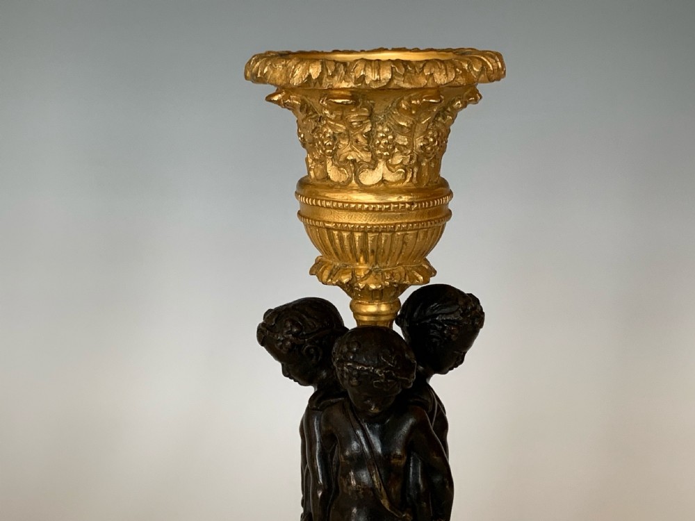 Fine pair of French Ormolu Candlesticks View IV
