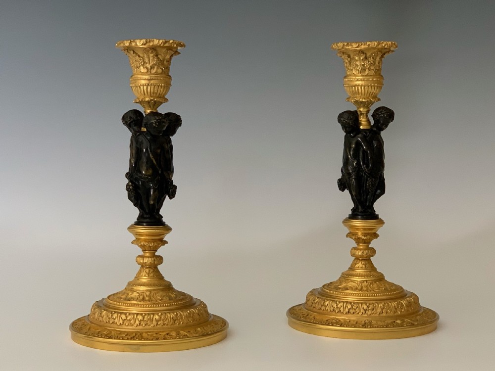 Fine pair of French Ormolu Candlesticks View V