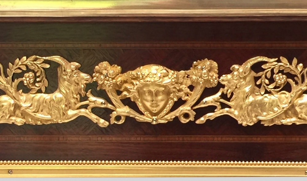 A rectangular Louis XVI style centre table featuring a variegated marble top, dark mahogany frieze with elaborate gilt bronze mounts, and four fluted tapered legs. View VII