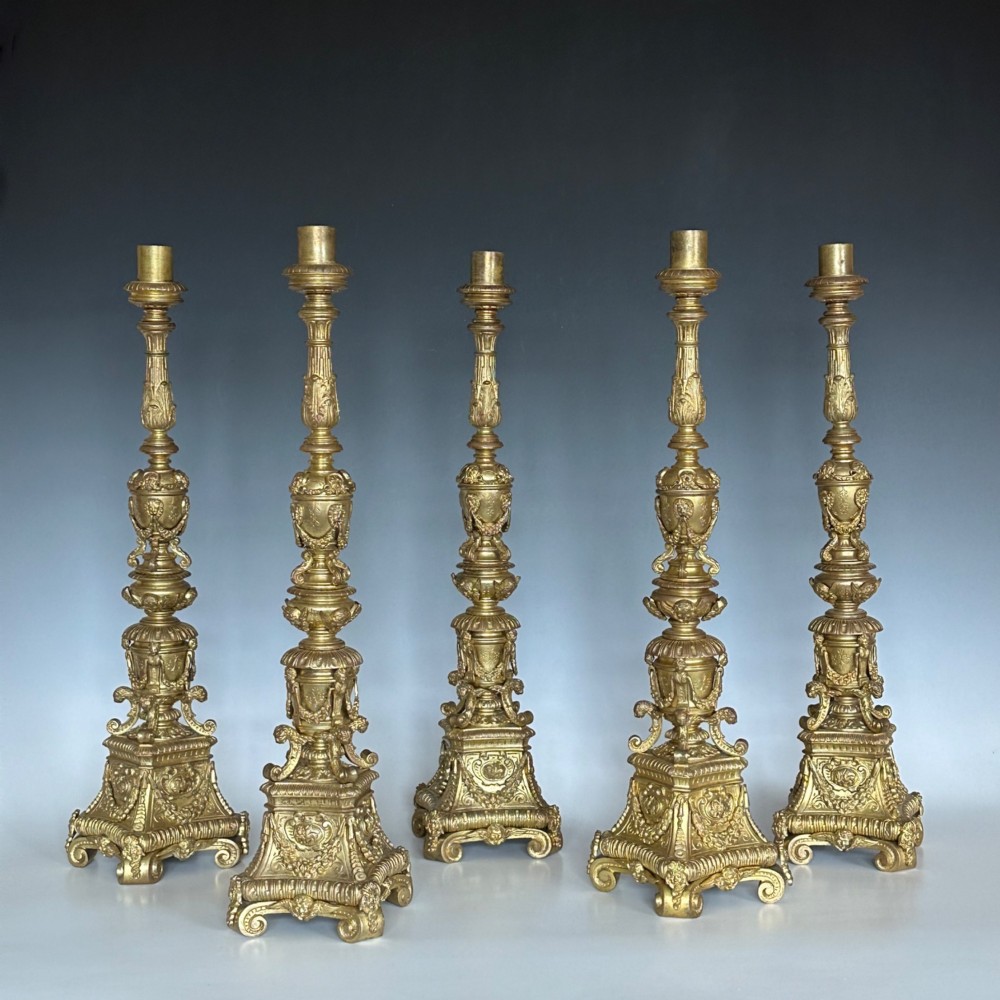 Five 18th Century Venetian Gilt Bronze Candlesticks