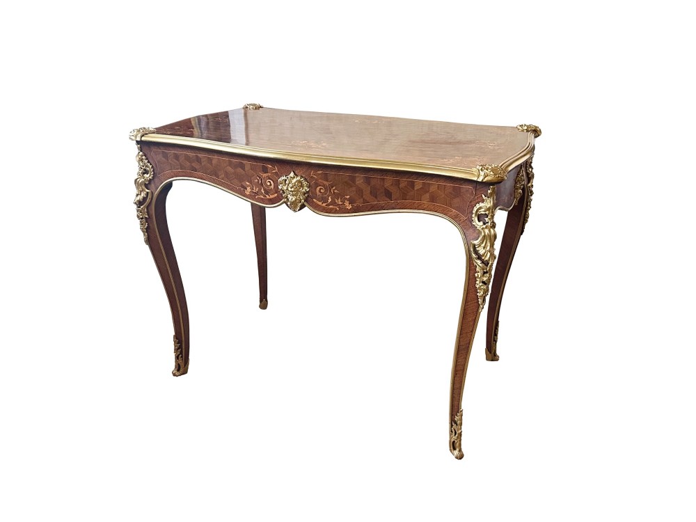 A French Louis XV style rosewood centre table featuring geometric parquetry, floral marquetry inlay, gilt-bronze ormolu mounts, and cabriole legs. View VI