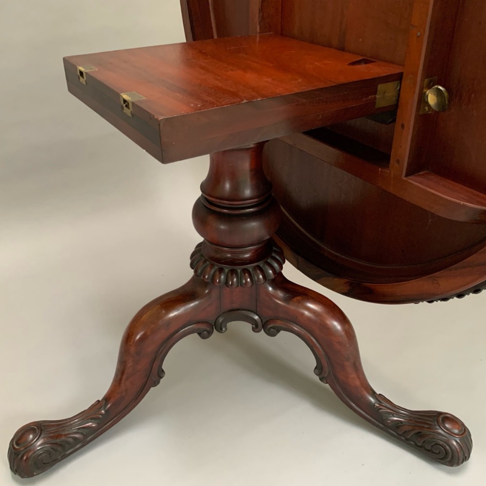 A 19th-century William IV oval centre table constructed from figured albuera wood with a gadrooned rim and a turned pedestal base. View V