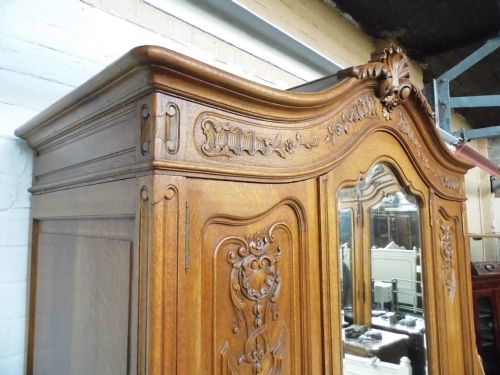 LARGE CARVED OAK FRENCH ARMOIRE - ADDITIONAL PHOTO 1