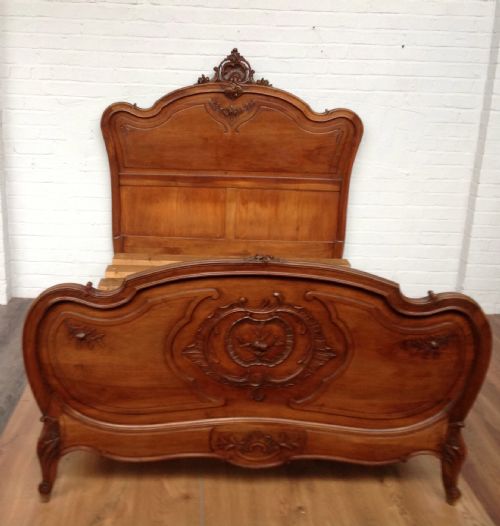 carved kingsize french bed - CATEGORY: ANTIQUE BEDS - DATED 1900