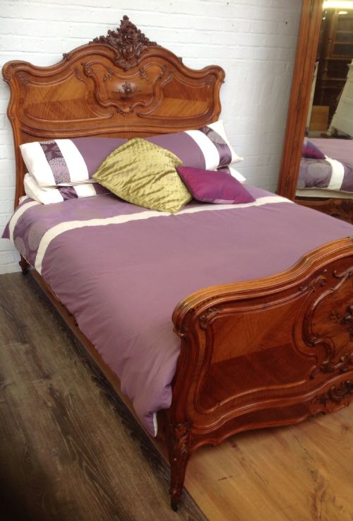 ornately carved french walnut kingsize bed - CATEGORY: ANTIQUE BEDS - DATED 1890