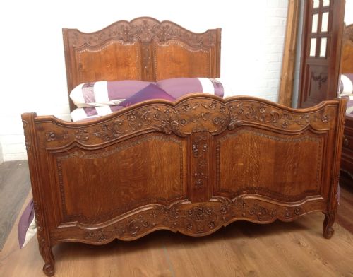 ornately carved french oak double bed - CATEGORY: ANTIQUE BEDS - DATED 1890
