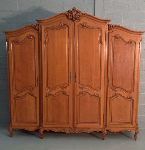 large breakfront carved 4 door oak armoire - CATEGORY: ANTIQUE WARDROBES - DATED 1920
